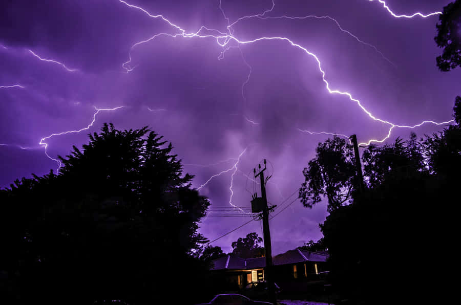 Purple Lightning At Night Wallpaper