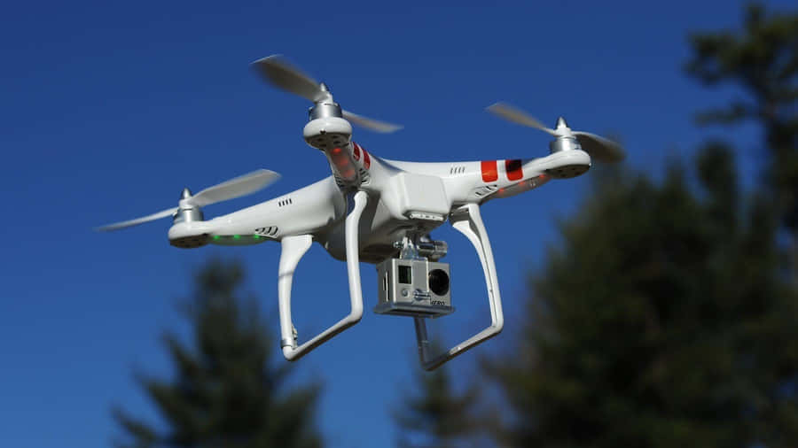 Quadcopter Drone In Flight Wallpaper