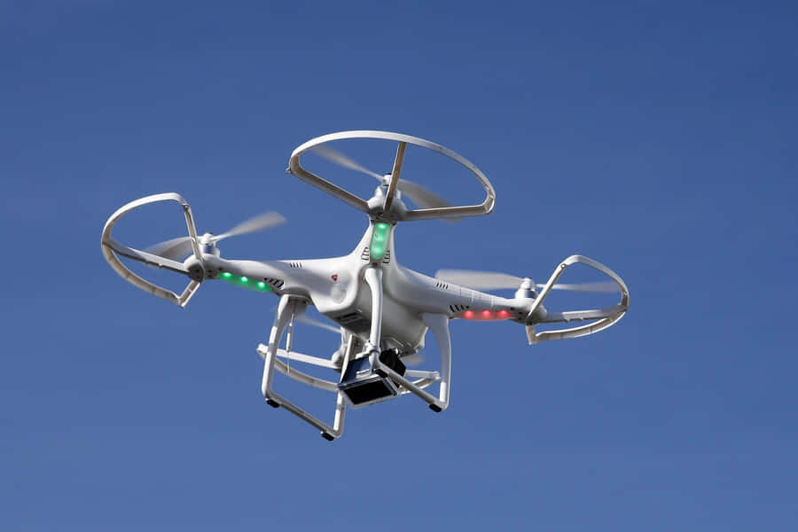 Quadcopter Drone In Flight Wallpaper