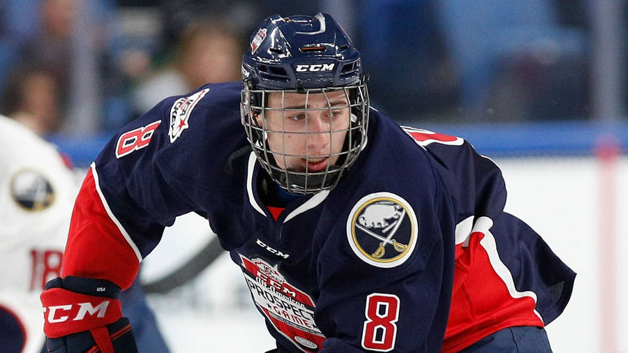 Quinn Hughes Elite Prospects Leaning Forward During Game Wallpaper