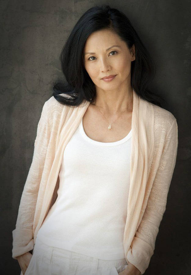 Radiant Beauty: Portrait Of Tamlyn Tomita Wallpaper