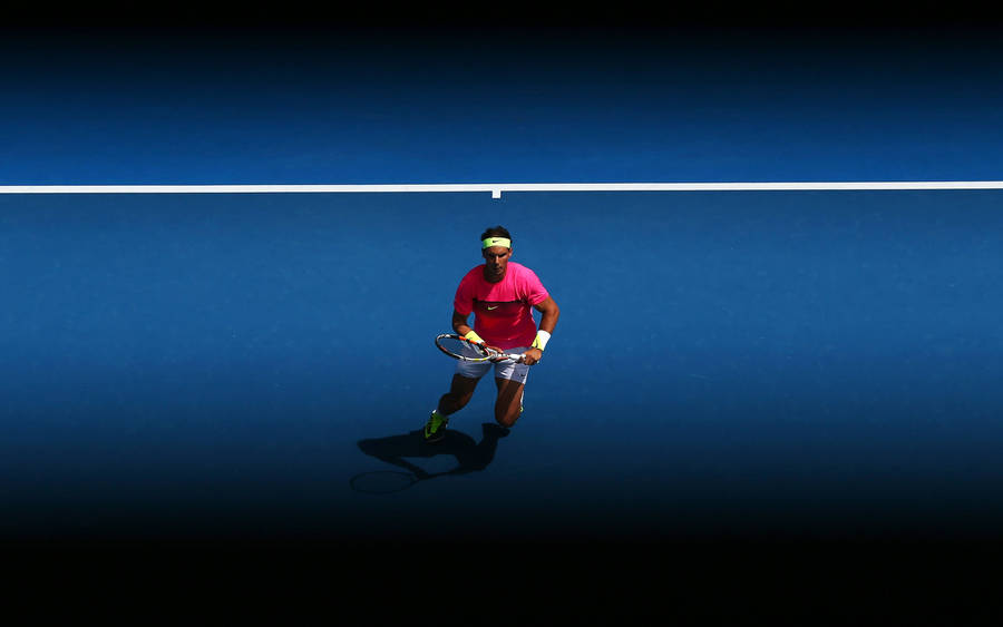 Rafael Nadal Running At Empty Court Wallpaper