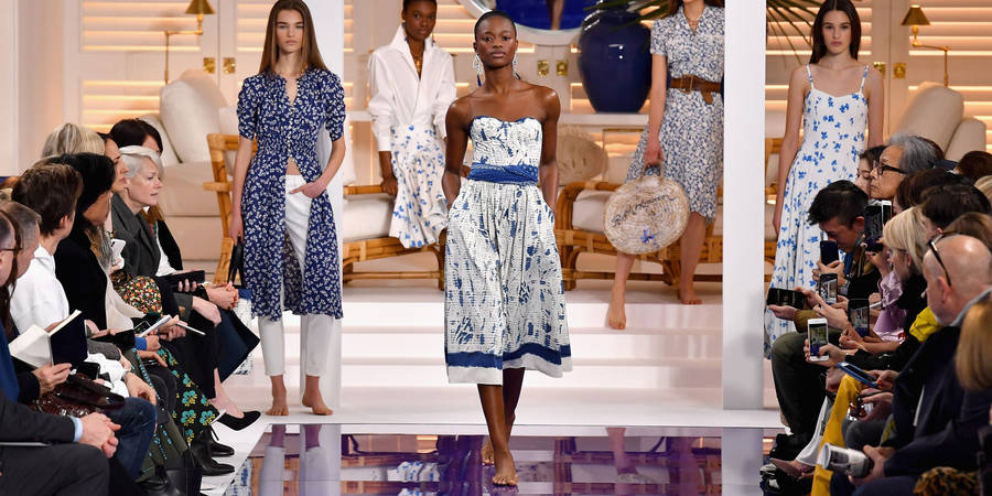 Ralph Lauren Corporation Modeling White Dress Wallpaper