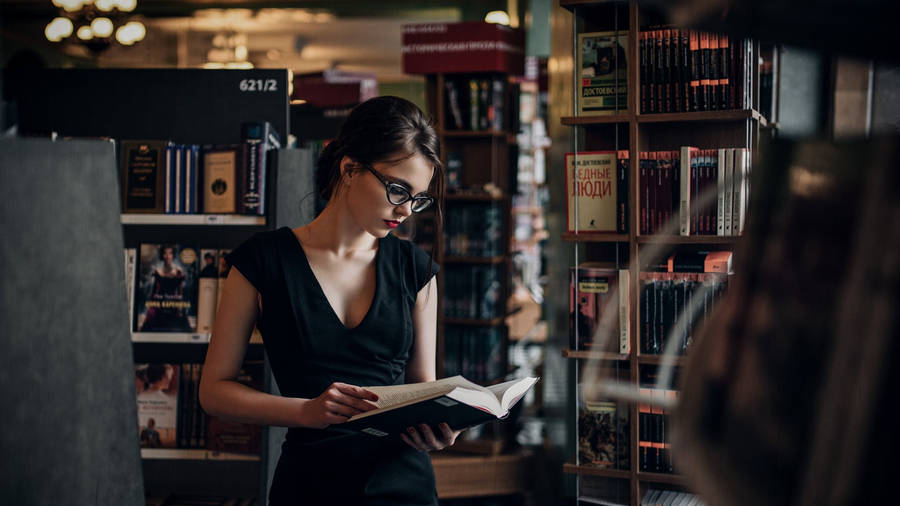 Reading Woman In Library Wallpaper