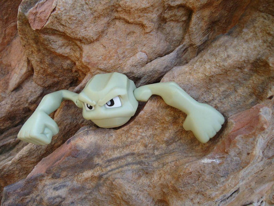 Realistic Geodude Pokemon On Rock Wallpaper