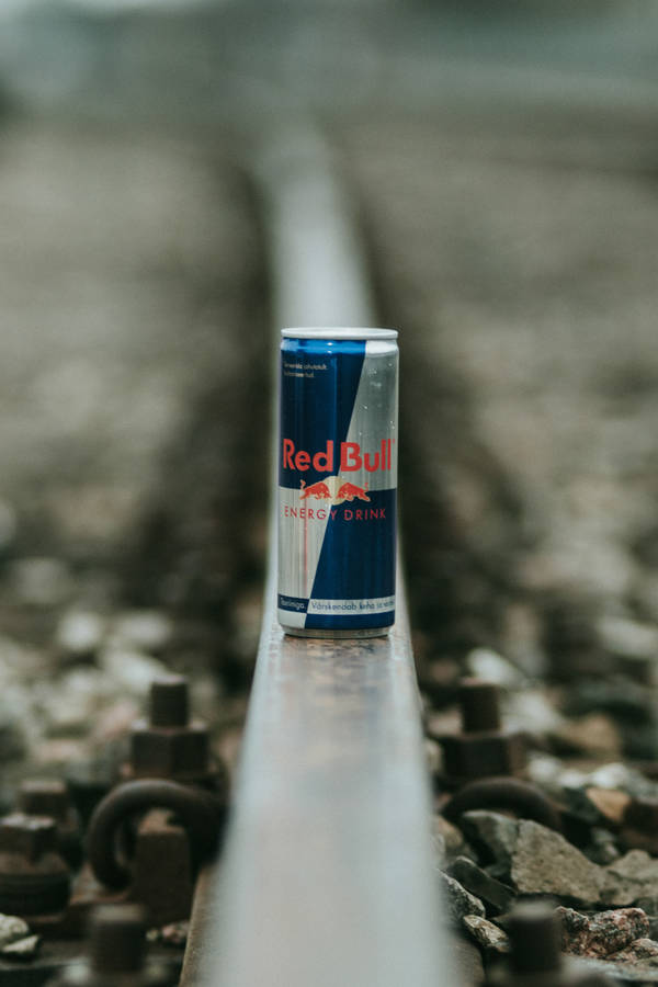 Red Bull On Gravel Macro Wallpaper