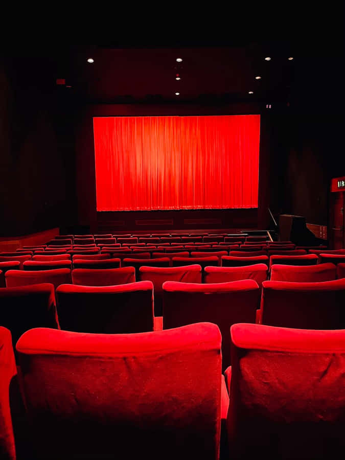 Red Cinema Hall Empty Seats Wallpaper