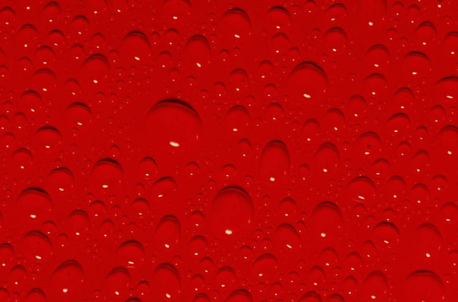 Red Color Surface With Drops Wallpaper