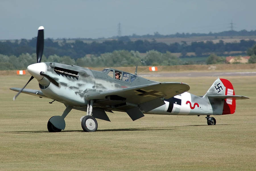 Red, Gray, And White German Ww2 Fighters Wallpaper