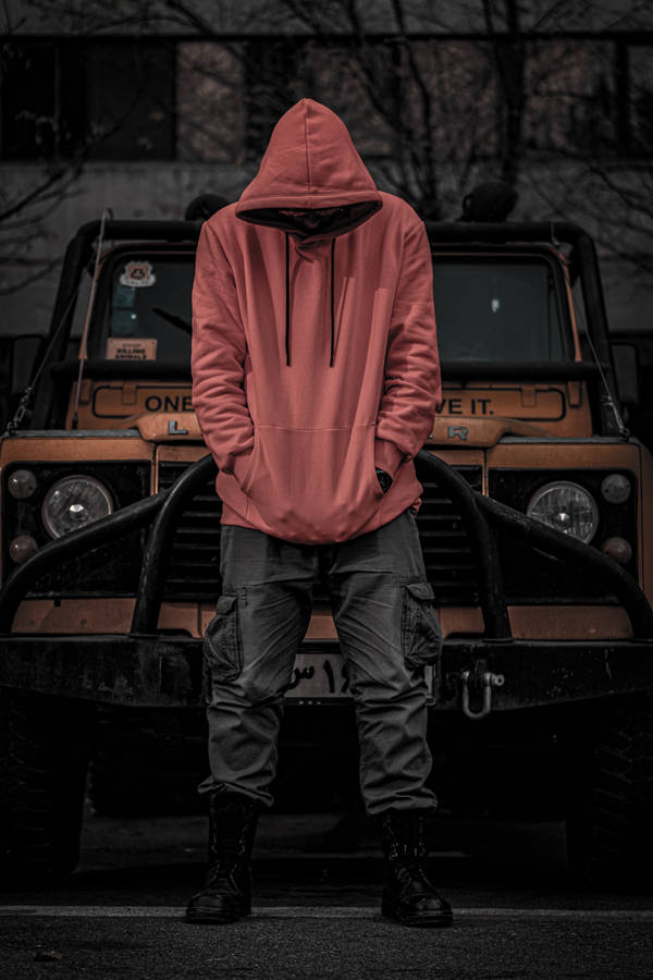 Red Hoodie In Front Of Truck Wallpaper