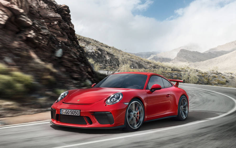 Red Porsche 911 Gt3 In Motion Wallpaper