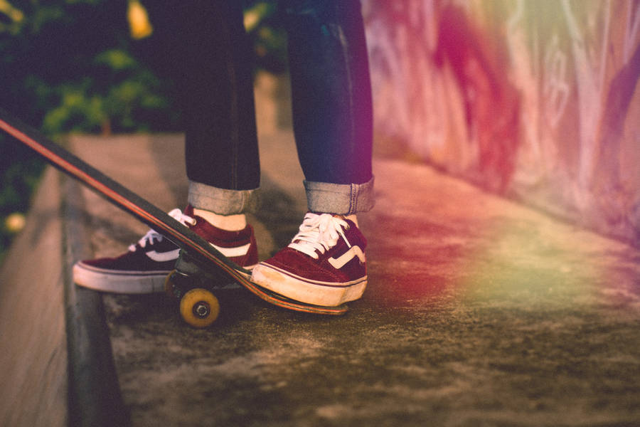 Red Vans On Skateboard Wallpaper