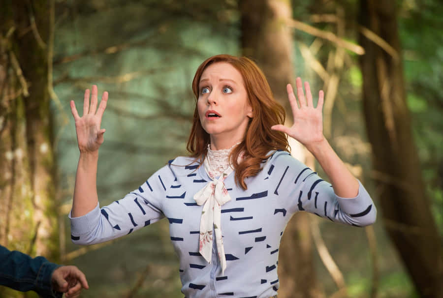 Redheaded Woman Surprised Gesture Forest Background Wallpaper