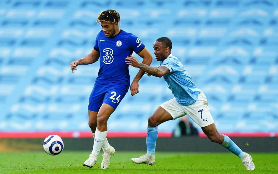 Reece James Kicking Ball Empty Seats Wallpaper