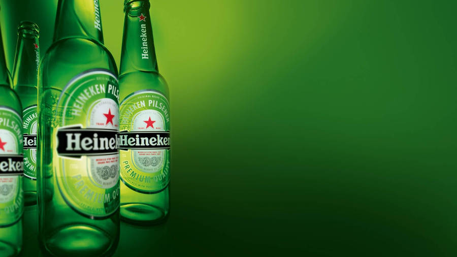 Refreshing Heineken Beer Bottles Lined Up Wallpaper