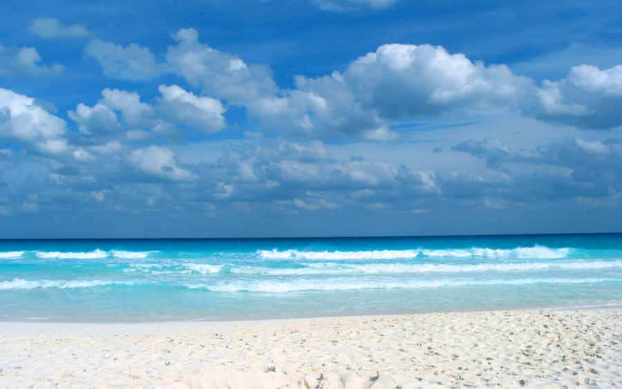 Relax And Unwind On This Caribbean Beach Wallpaper