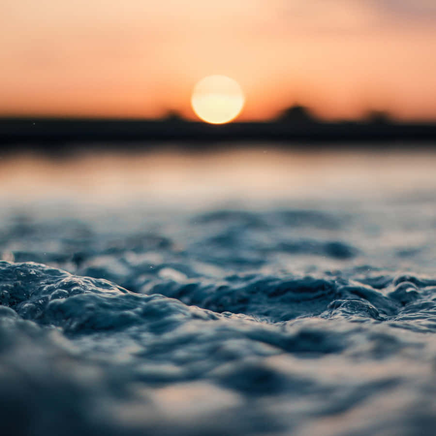 Relax And Unwind With An Ipad By The Pool Wallpaper