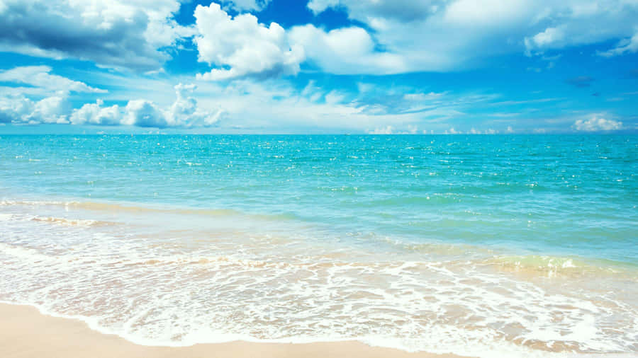 Relaxing View Of A Sunny Beach Wallpaper