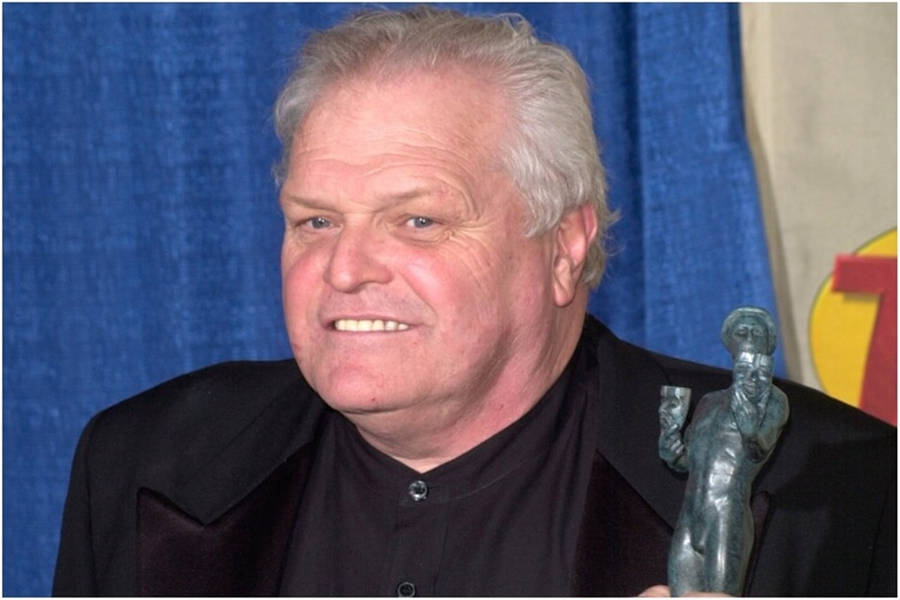 Renowned Actor Brian Dennehy Holding A Trophy Wallpaper