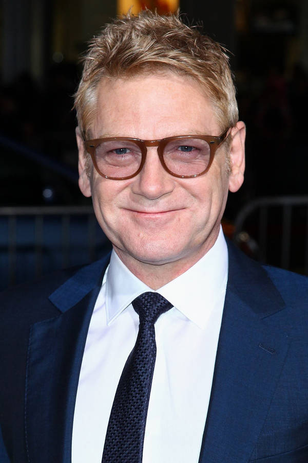 Renowned British Actor, Kenneth Branagh Looking Stylish In Sunglasses Wallpaper