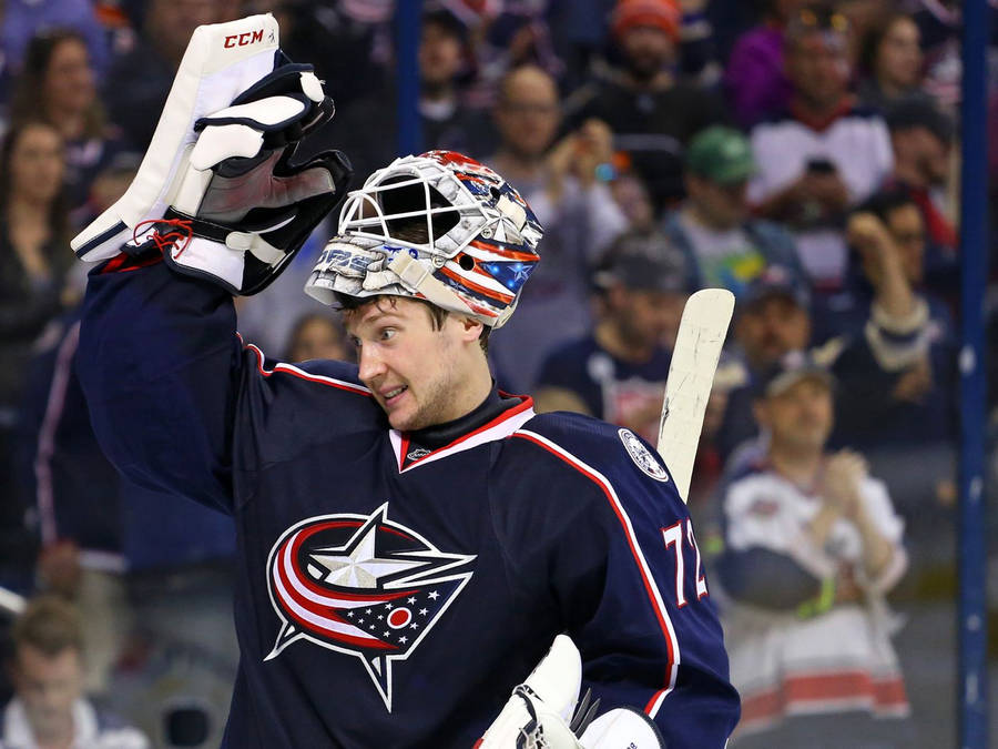 Renowned Nhl Star Sergei Bobrovsky Attentively Guarding The Hockey Goal Wallpaper