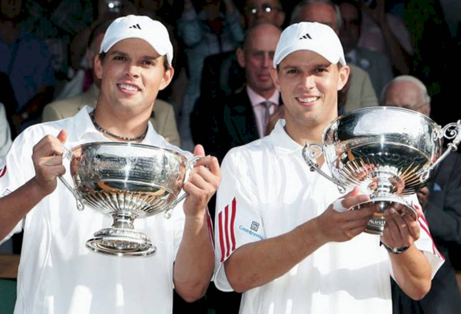 Renowned Tennis Duo Mike & Bob Bryan Celebrating Victory Wallpaper