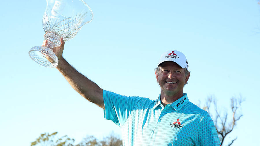 Retief Goosen Holding A Trophy Wallpaper