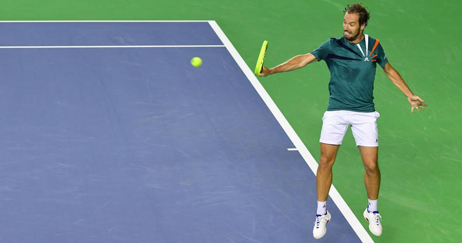 Richard Gasquet Playing Tennis Inside Court Wallpaper