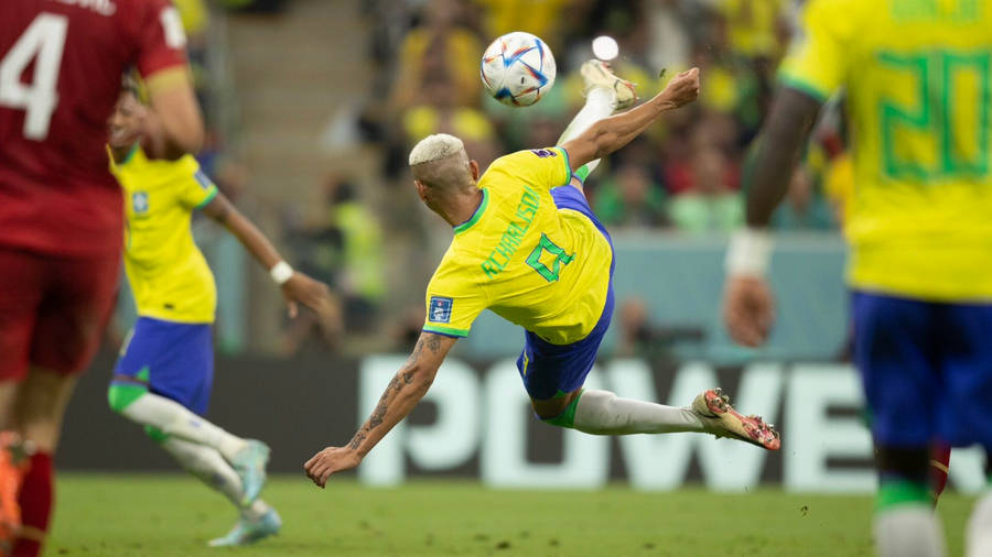 Richarlison De Andrade Kicking Football Wallpaper