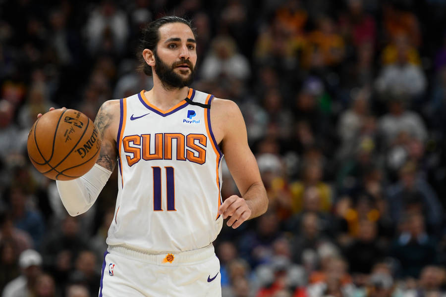 Ricky Rubio In Action For Phoenix Suns Wallpaper