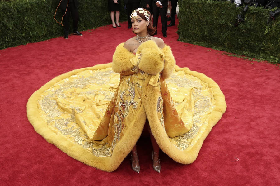 Rihanna In Yellow Dress At Met Gala Wallpaper