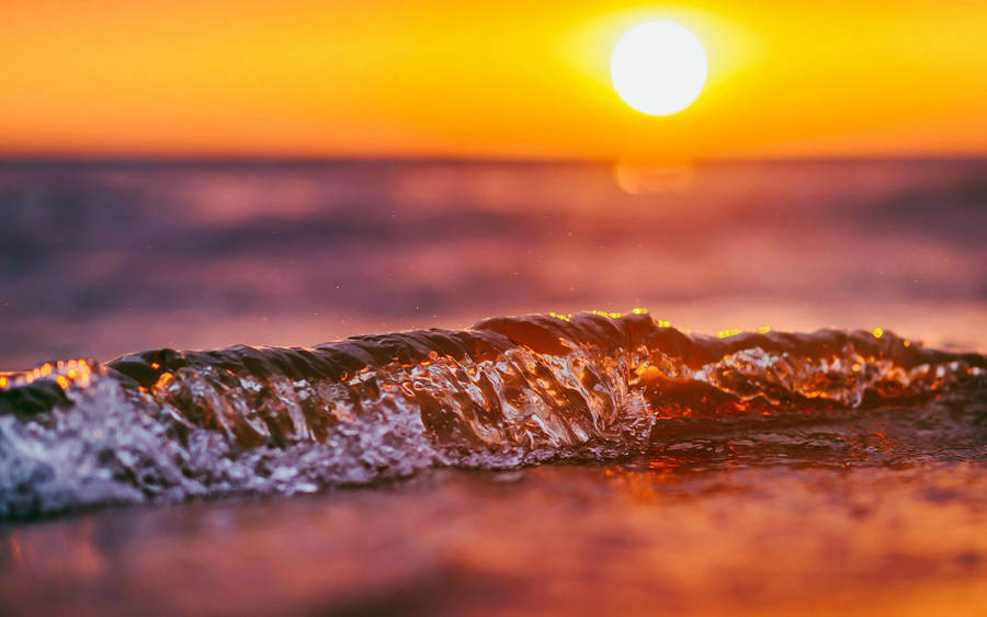 Rising Sun And Crashing Wave Wallpaper