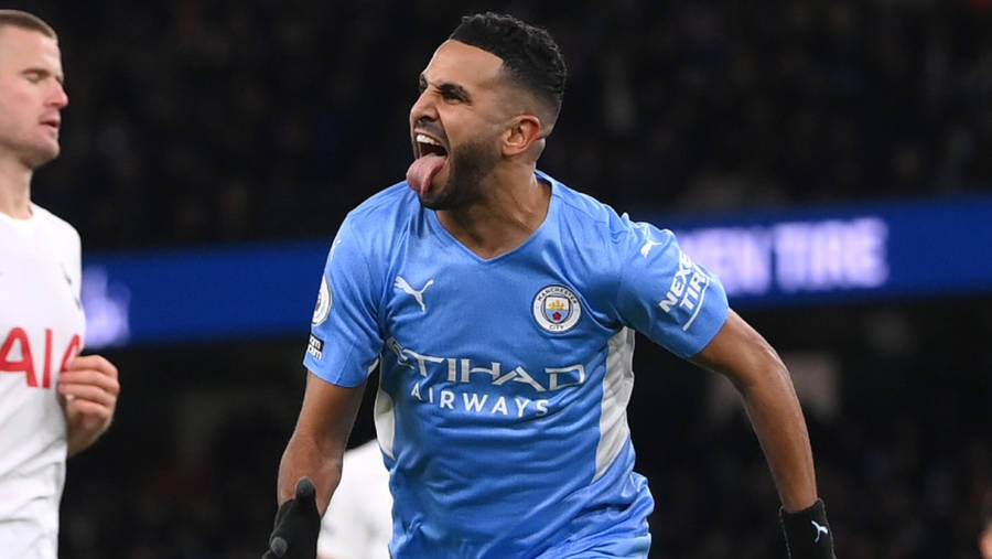 Riyad Mahrez Celebrating Tongue Out Wallpaper