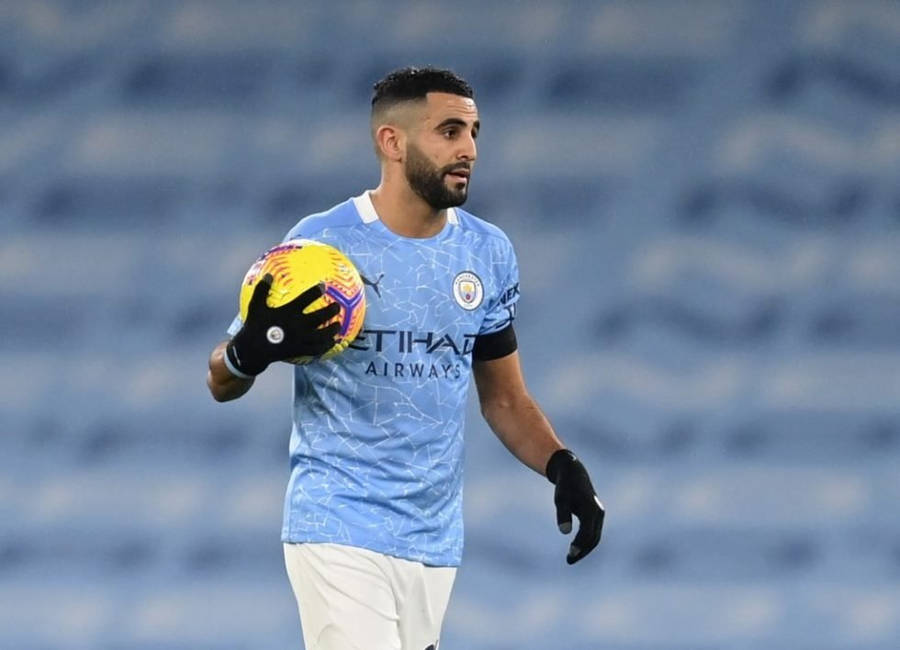 Riyad Mahrez Holding Yellow Ball Wallpaper