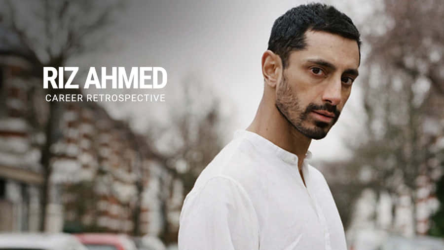 Riz Ahmed Career Retrospective Promotional Image Wallpaper