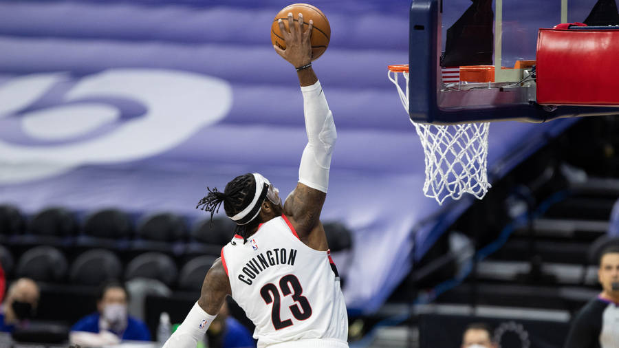 Robert Covington Dunks For The Team Wallpaper