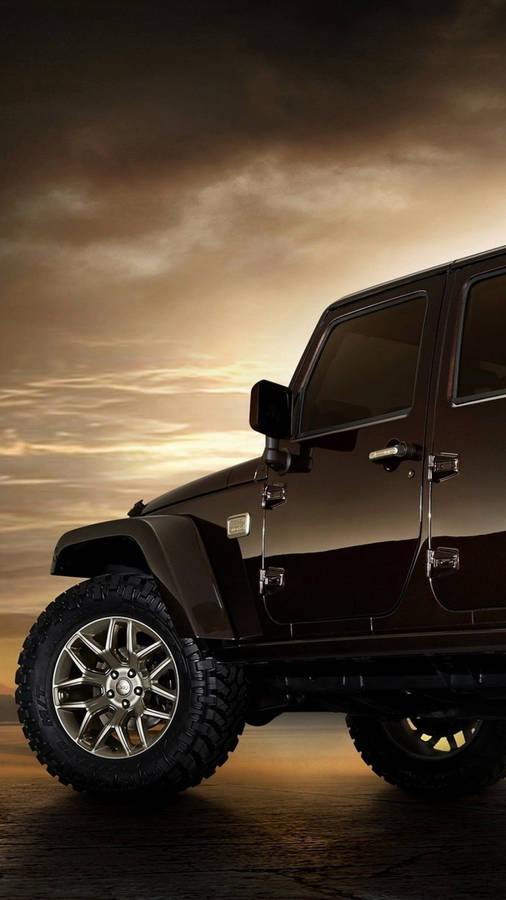 Robust Black Jeep Wrangler Unleashing Power On Unpredictable Terrains Wallpaper