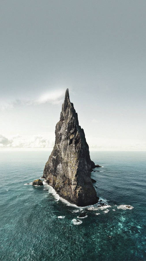Rock Formation Middle Of The Ocean Iphone Wallpaper