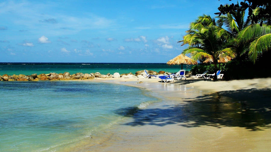 Rocky White-sand Beach In Montego Bay Wallpaper