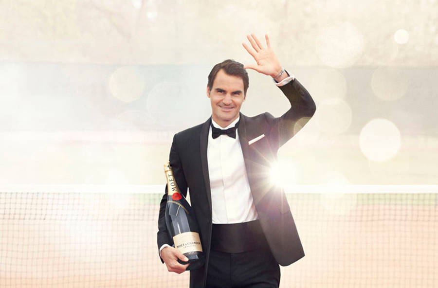 Roger Federer Celebrates With Moët & Chandon Champagne Wallpaper