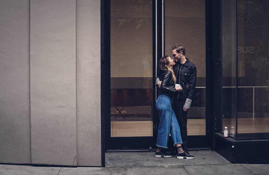 Romantic Couple Enjoying Golden Hour Wallpaper