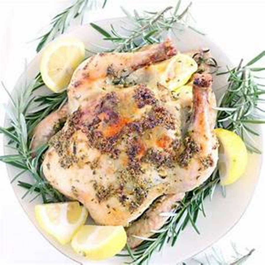 Rosemary And Lemon On Whole Roast Chicken Wallpaper