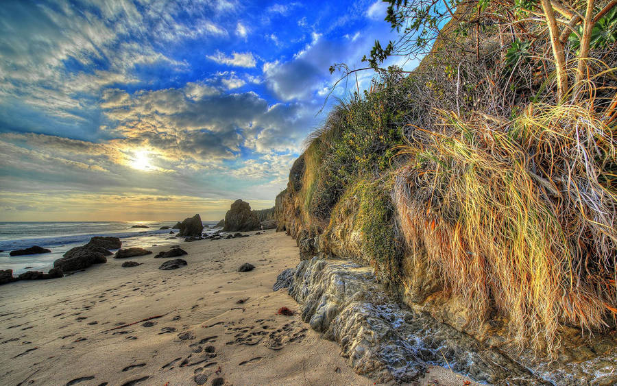 Rugged Hillside On Malibu Beach Wallpaper