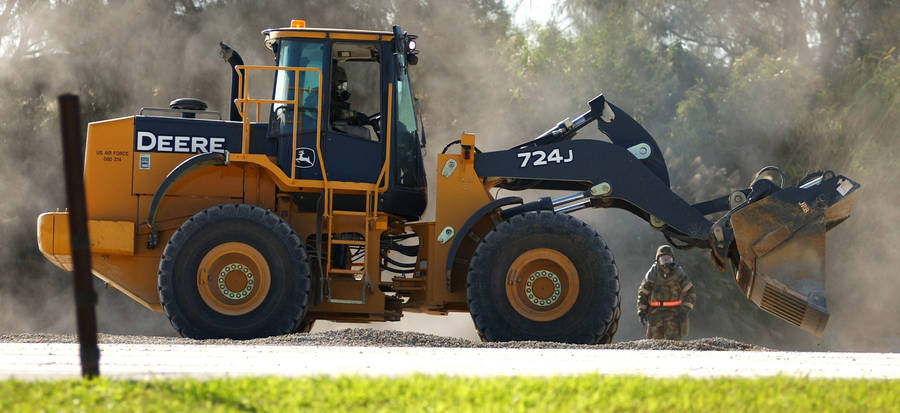 Rugged, Reliable John Deere Loader In Action Wallpaper