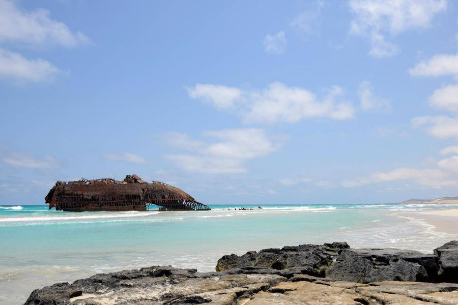 Rusty Boat In Cape Verde Beach Wallpaper