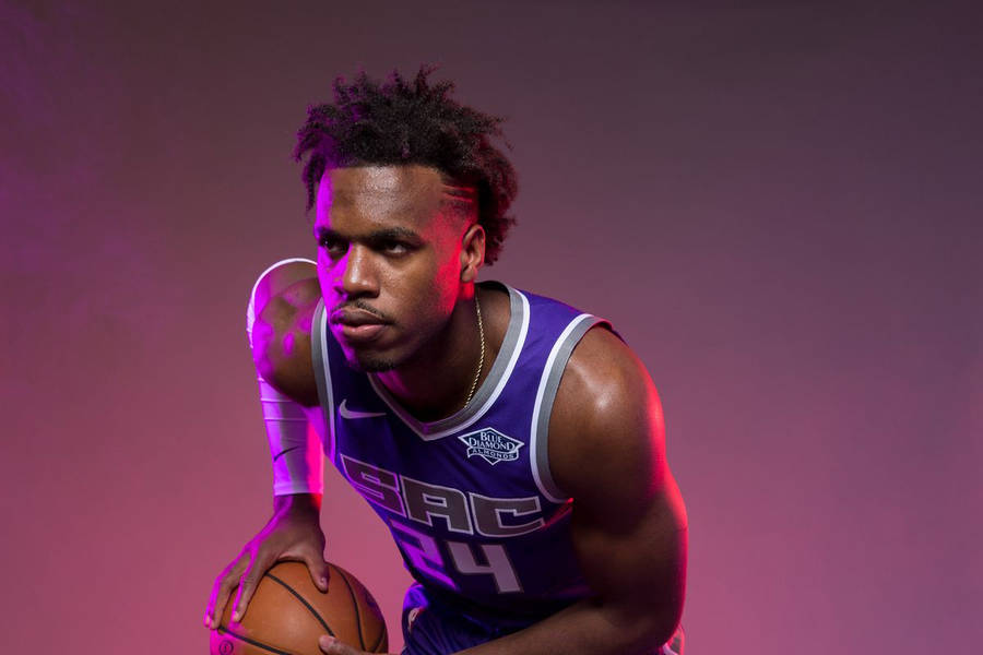 Sacramento Kings' Buddy Hield Posing For A Portrait Wallpaper