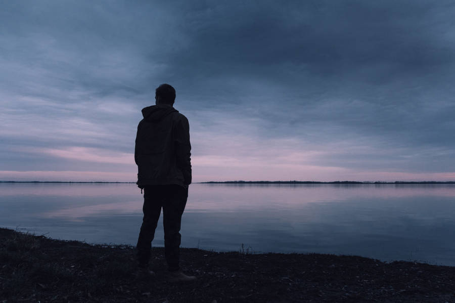 Sad Boy Near Beach Wallpaper