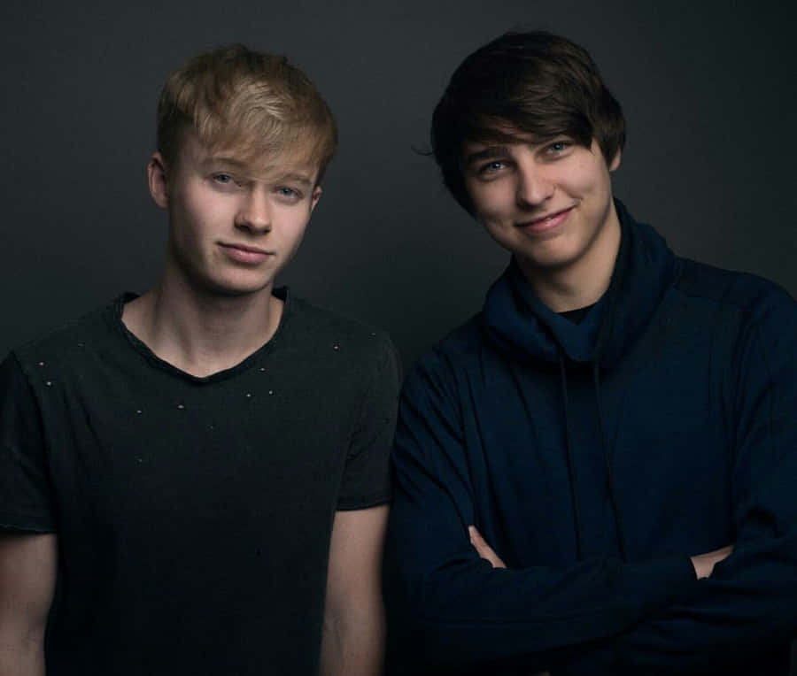 Sam And Colby Playing Tag Wallpaper