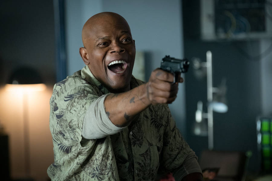 Samuel L Jackson Laughing With Gun Wallpaper