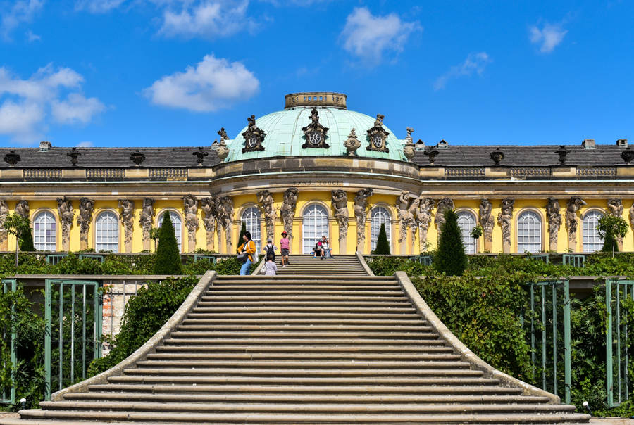 Sanssouci Palace Potsdam With Tourists Wallpaper